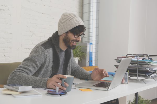 Millennial working on a Mac 